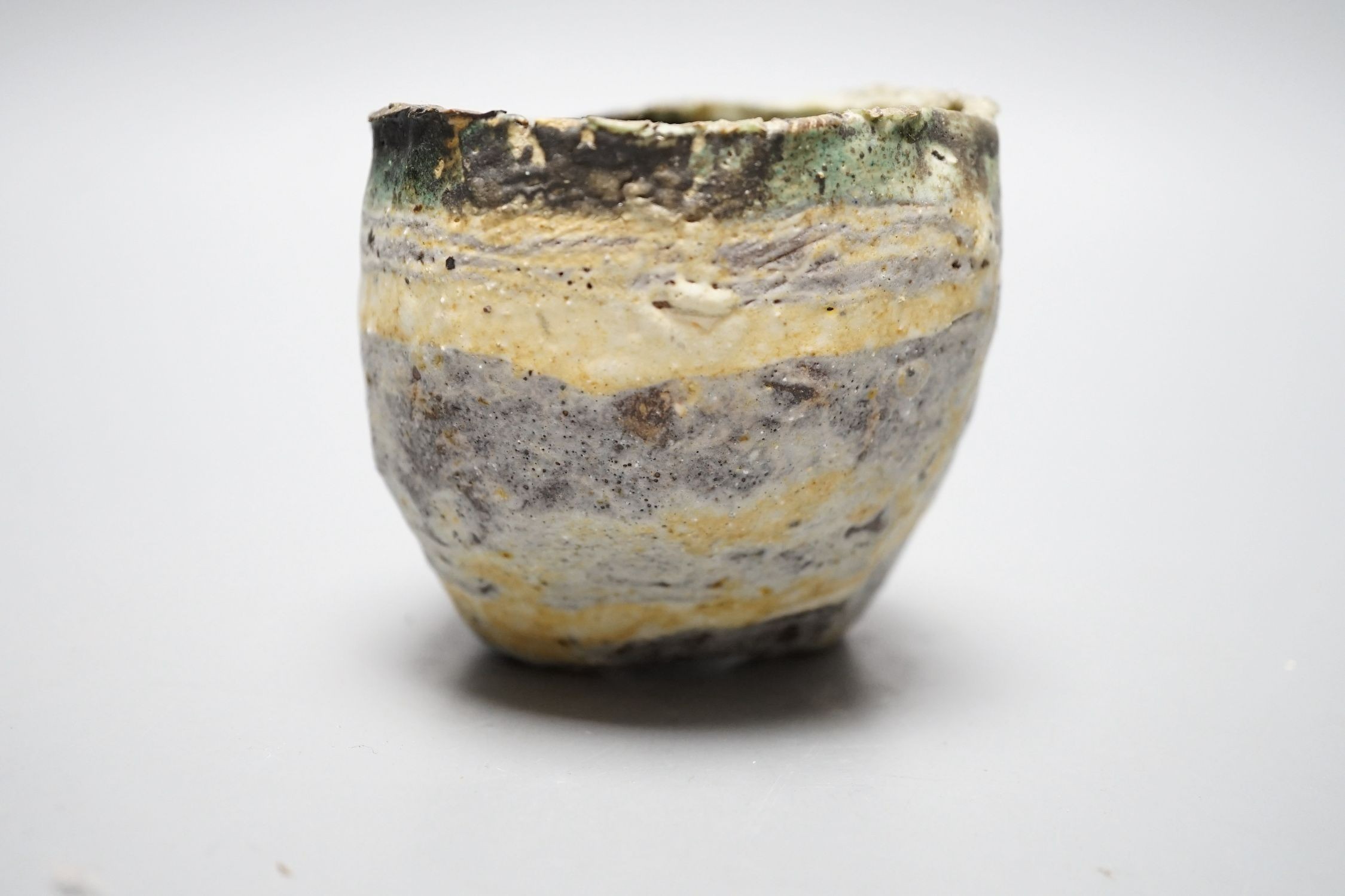Ewen Henderson (1934-2000), a hand-built mixed laminated clay unomi, 8.5cm tall